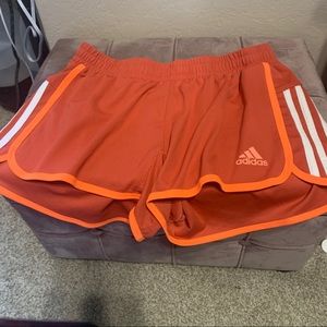 Orange Adidas shorts